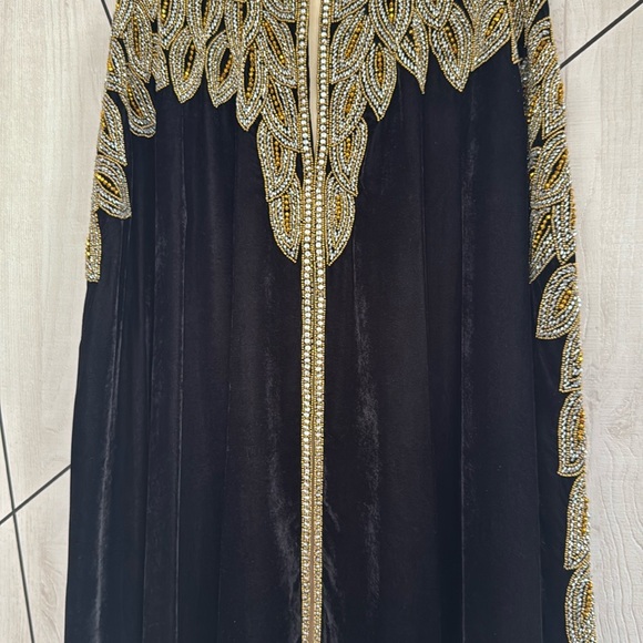Luxurious Black and Gold Maxi Dress with Intricate Embellishments - Picture 2 of 6